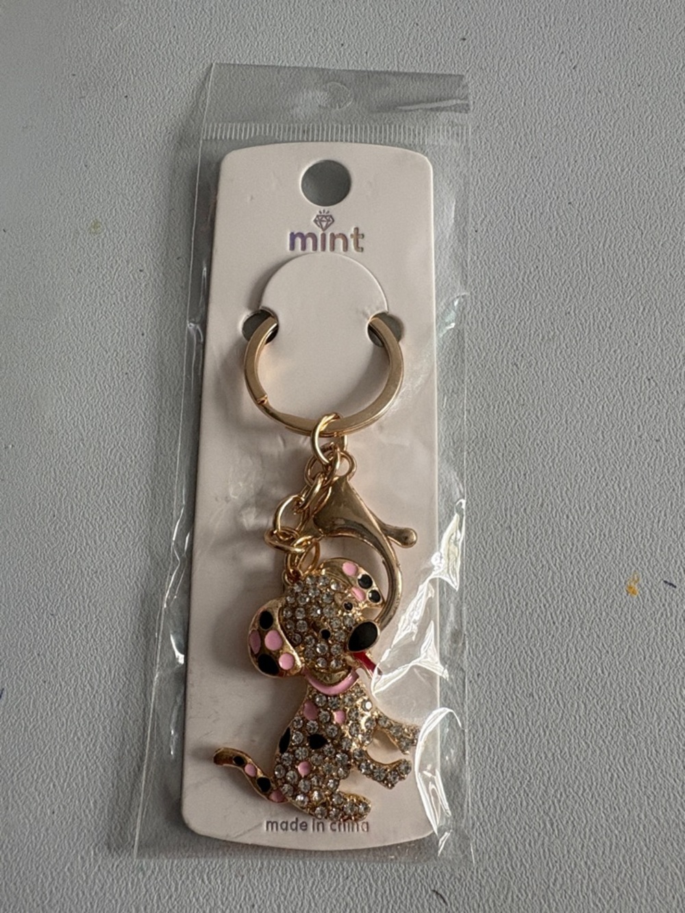 Mint Gold-Tone Puppy Keychain with Pink and Black Accents